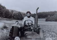 On tractor, around 1979